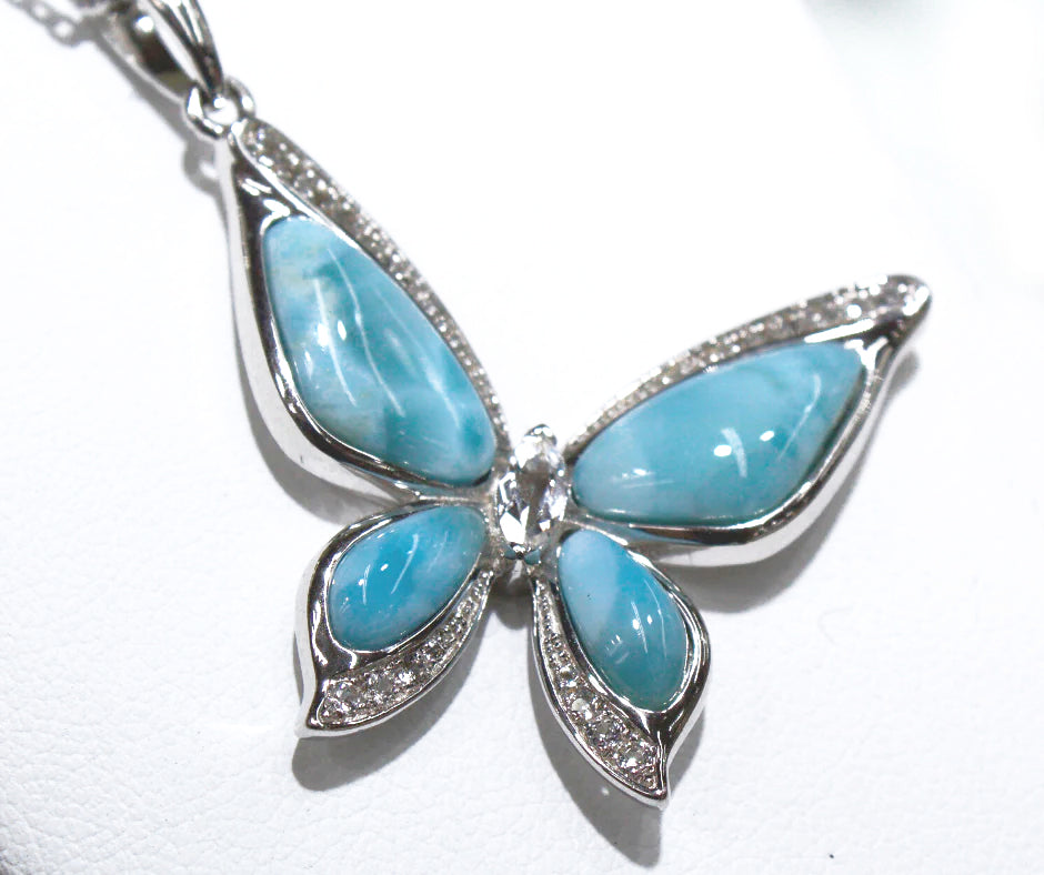 MAJESTIC BLUE LARIMAR BUTTERFLY ENCRUSTED WHITE ZIRCON
