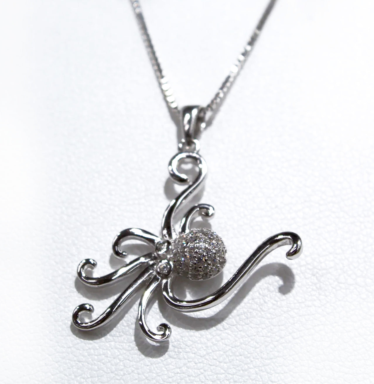STERLING SILVER OCTOPUS PENDANT WITH WHITE TOPAZ