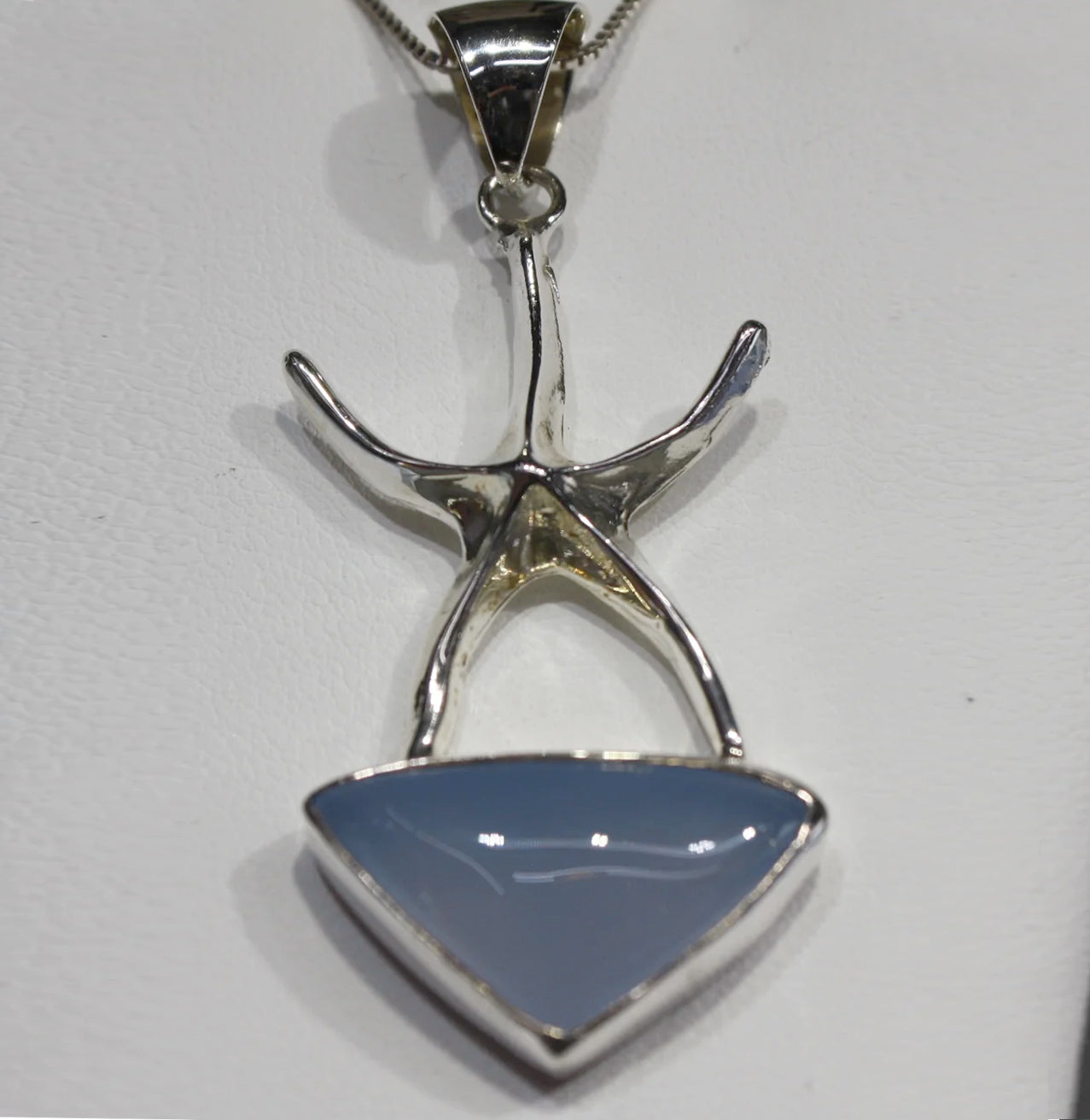EXQUISITE STERLING SILVER STARFISH PENDANT ON AT EYE BLUE TRIANGLE CRYSTAL