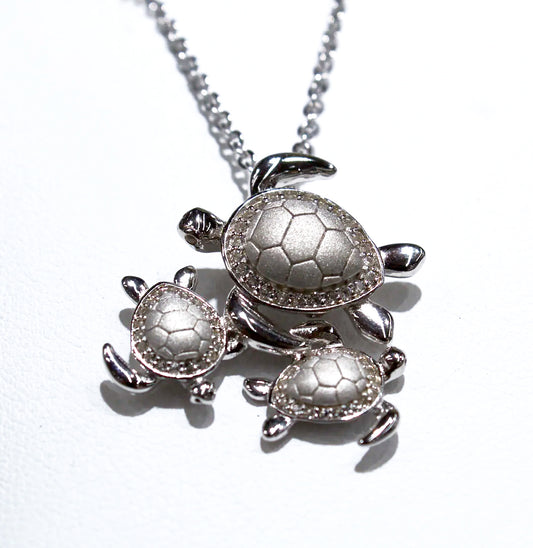 NATURAL MATTE AND SHINY SILVER TURTLE TRIO PENDANT
