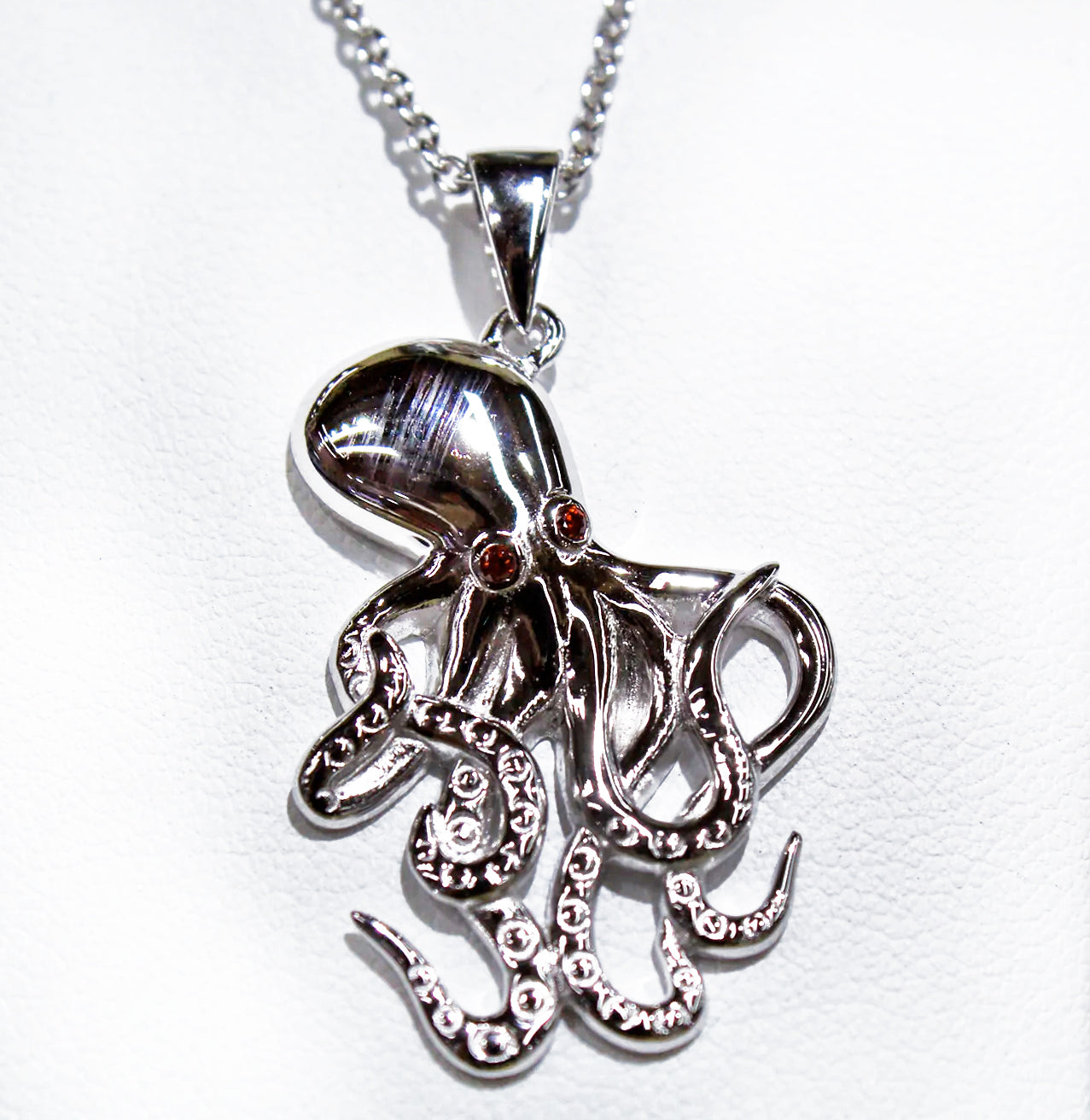 OCTOPUS CHARM WITH RED ZIRCON EYES