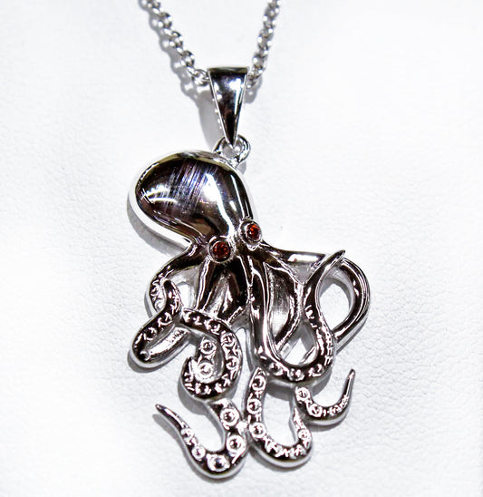 OCTOPUS CHARM WITH RED ZIRCON EYES
