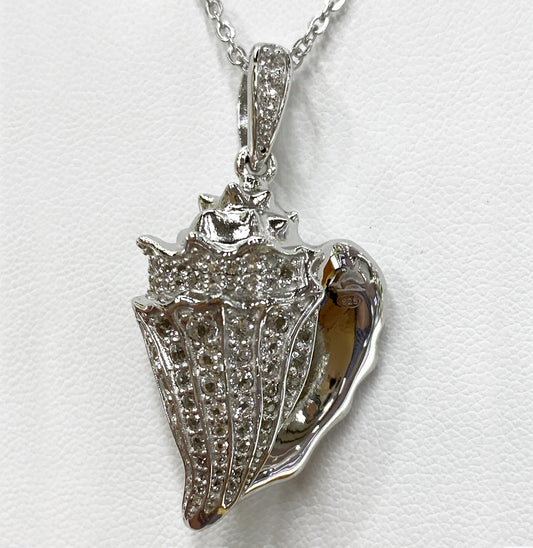 STERLING SILVER CONCH SHELL WITH WHITE TOPAZ