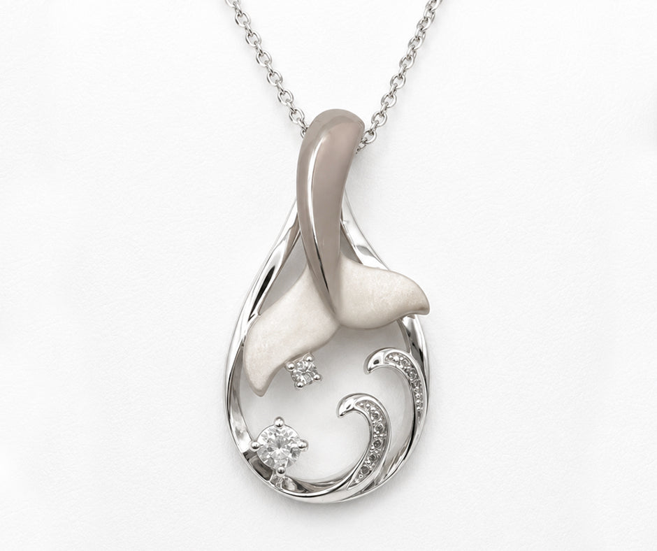 STERLING SILVER DOLPHIN TAIL ON WAVE WITH WHITE ZIRCON PENDANT