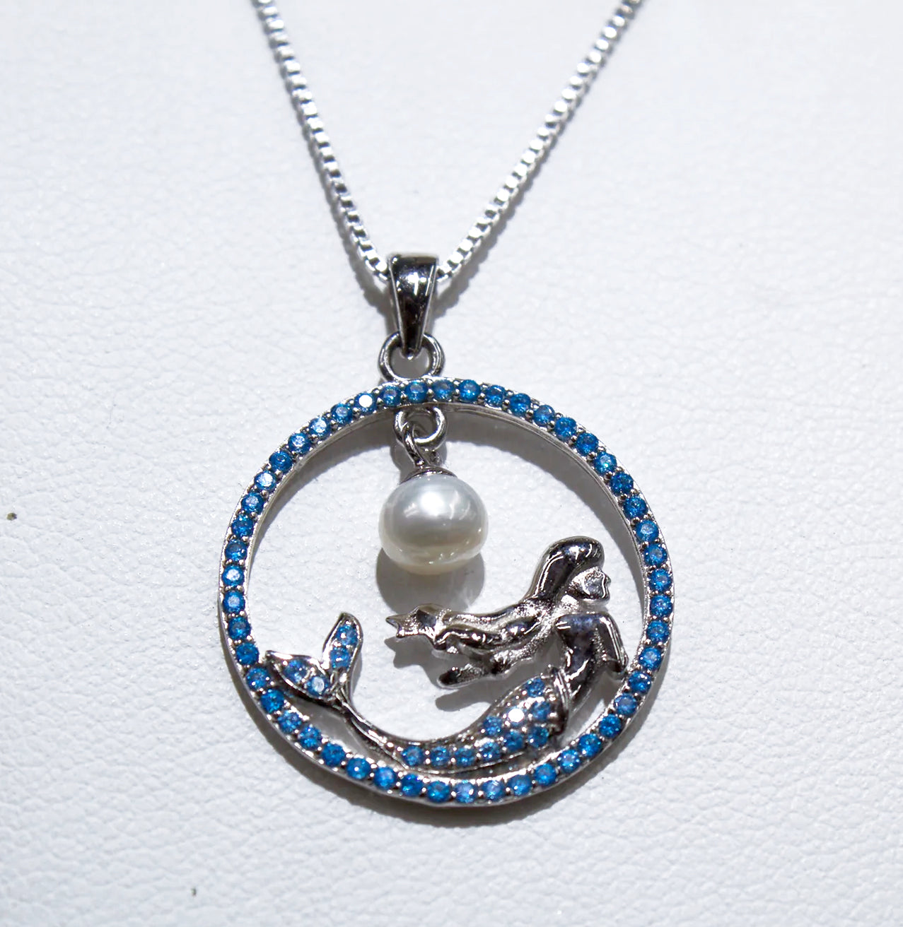STERLING SILVER MERMAID WITHIN BLUE TOPAZ AND HANGING WHITE PEARL