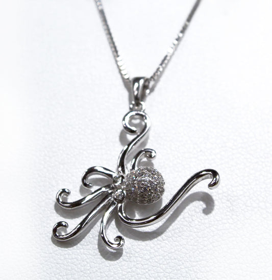 STERLING SILVER OCTOPUS PENDANT WITH WHITE TOPAZ