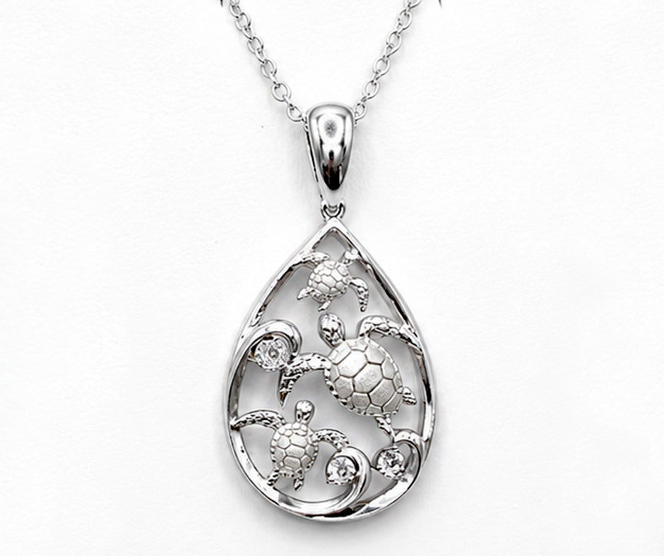 STERLING SILVER TURTLES WITH WHITE ZIRCON PENDANT